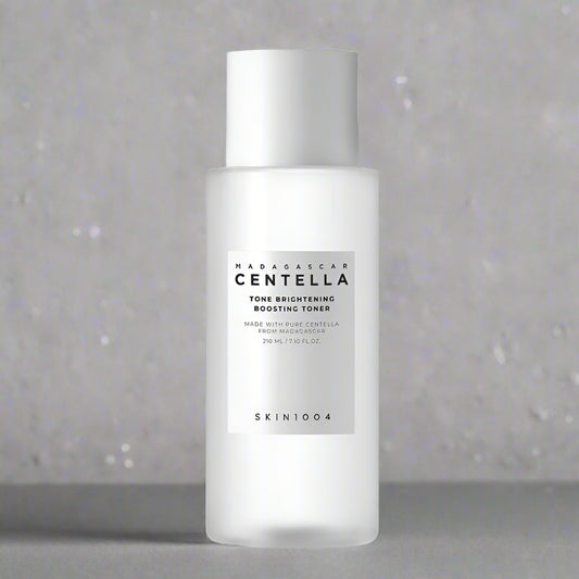 Skincare bottle labeled 'Madagascar Centella' on a white background