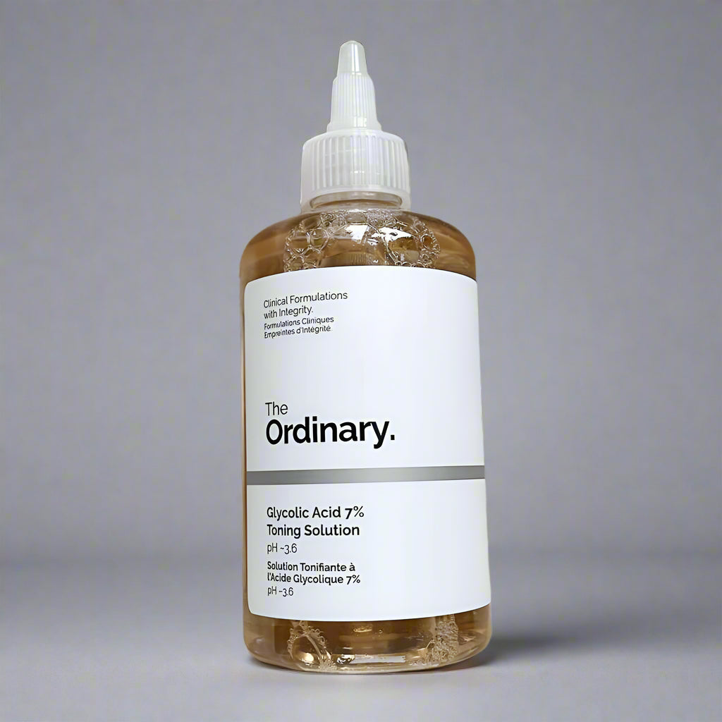 Bottle of 'The Ordinary' Glycolic Acid 7% Toning Solution on a beige fabric background